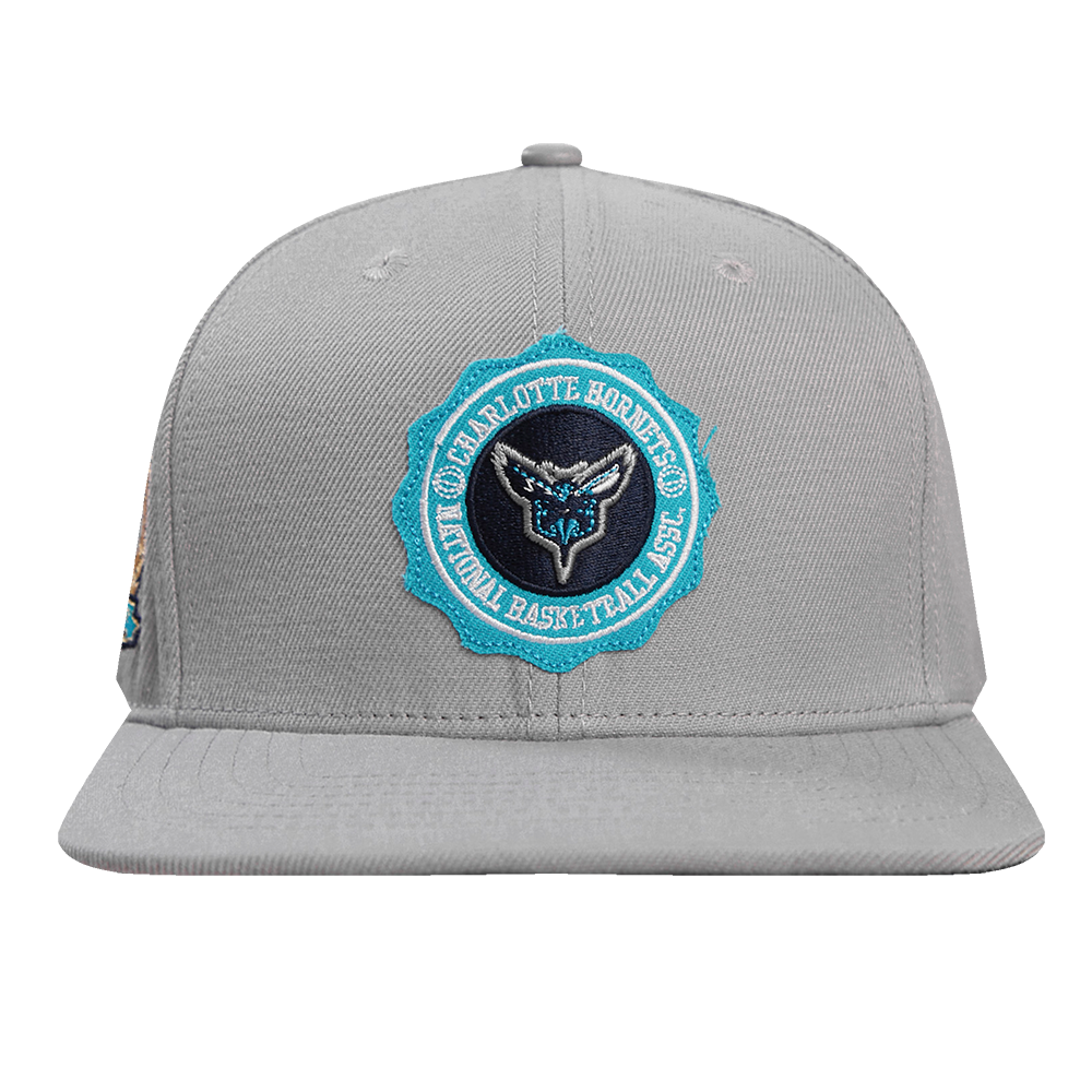 GORRA SNAPBACK NBA CHARLOTTE HORNETS CREST EMBLEM