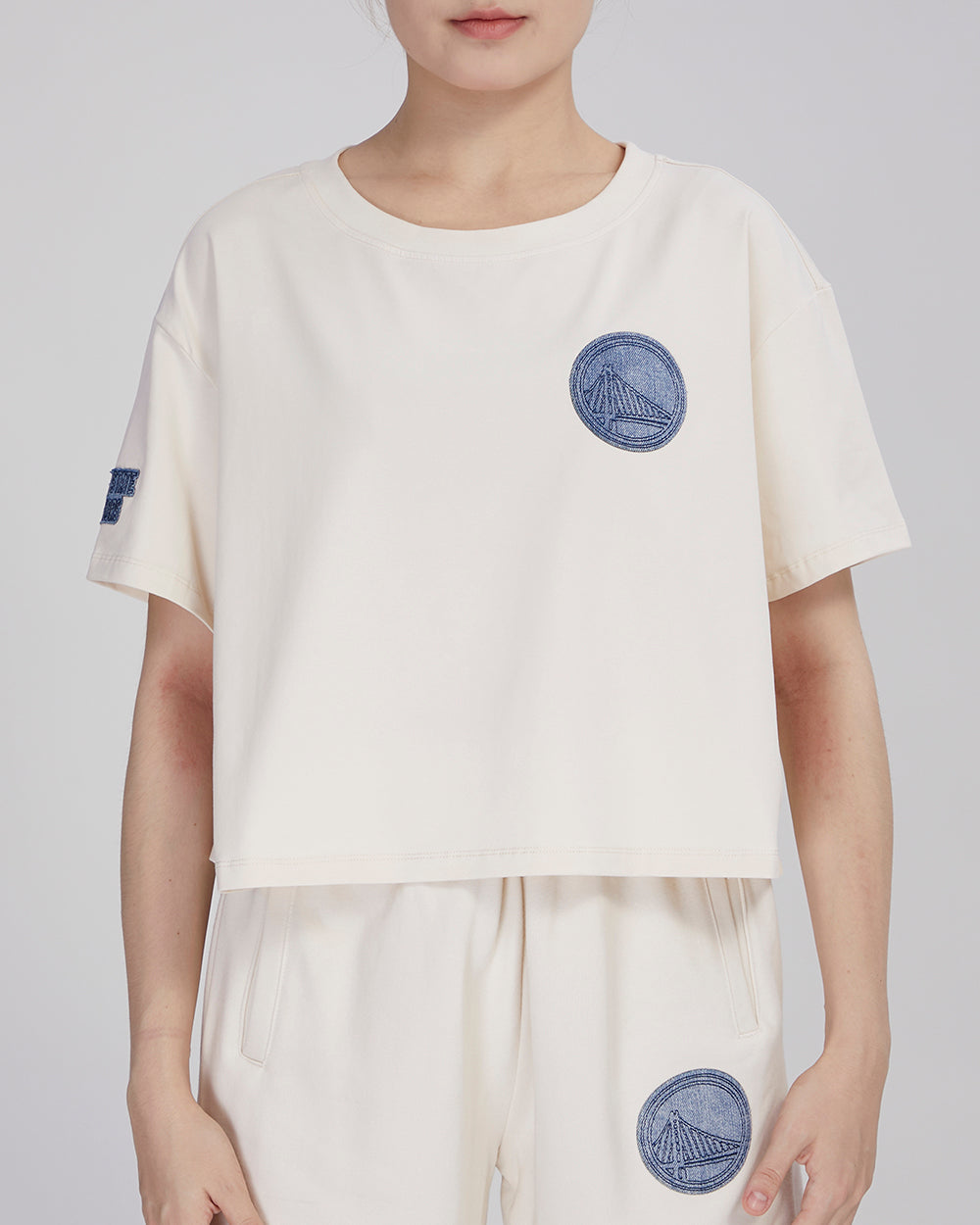 PLAYERA CROP NBA GOLDEN STATE WARRIORS VARSITY BLUES PARA MUJER