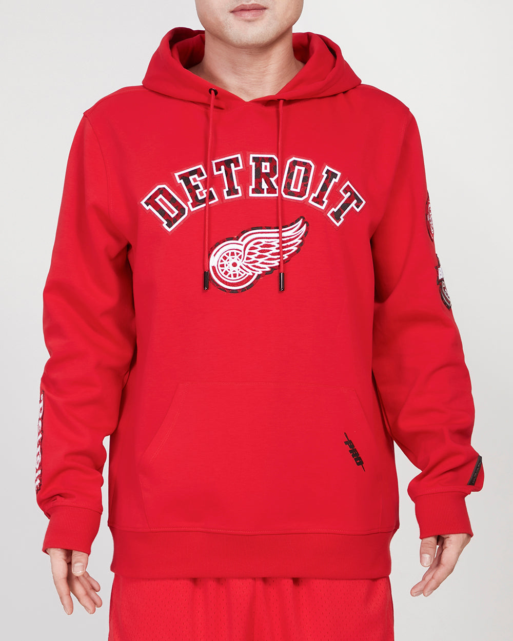 SUDADERA CON GORRO NHL DETROIT RED WINGS ANIMAL PRINT